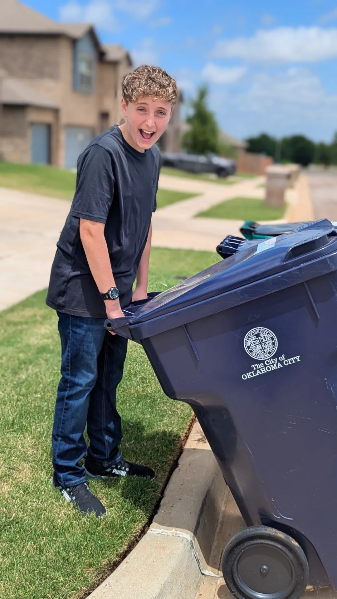 Trash bins placed at curb on Sunday evening in Summerhill neighborhood